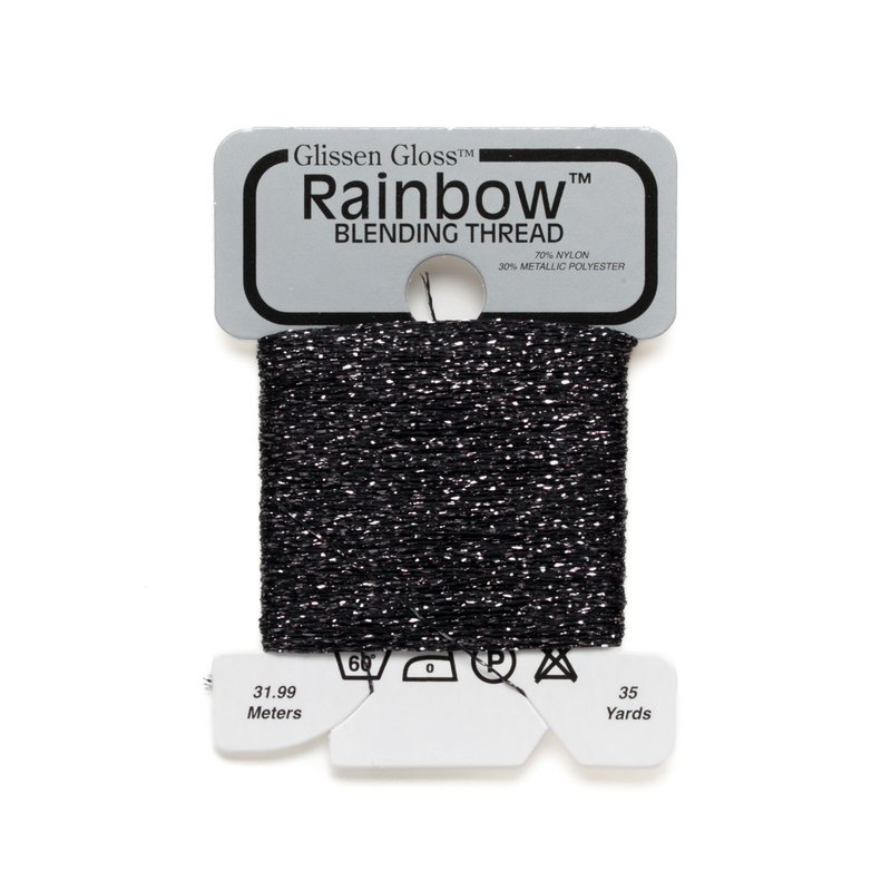 Iridescent gray black yellow Glissen Gloss Rainbow blending thread spool on white background.