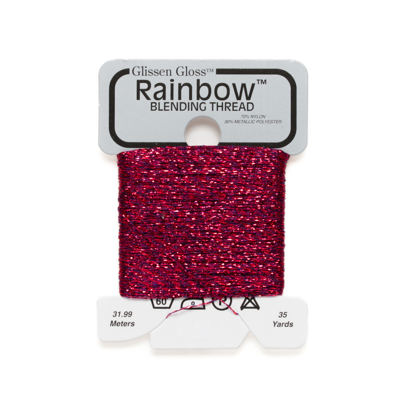 Iridescent berry red Glissen Gloss Rainbow blending thread spool on white background.