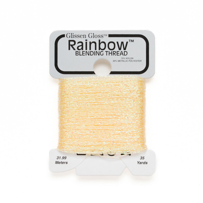 Iridescent cornsilk yellow Glissen Gloss Rainbow blending thread spool on white background.