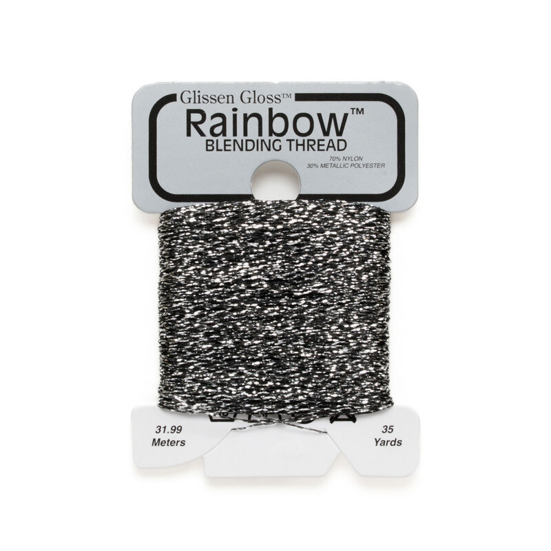 Iridescent pewter gray Glissen Gloss Rainbow blending thread spool on white background.