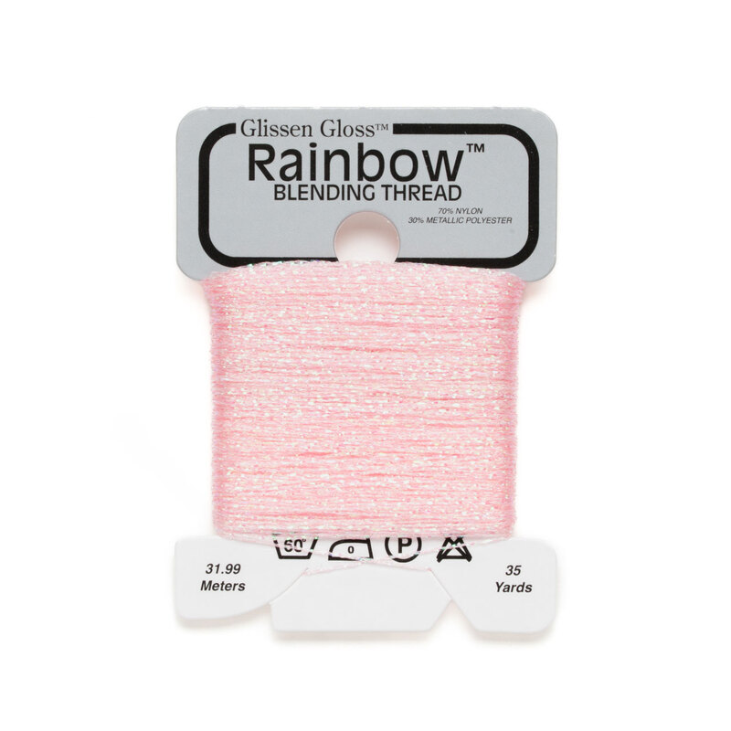 Iridescent pale pink Glissen Gloss Rainbow blending thread spool on white background.