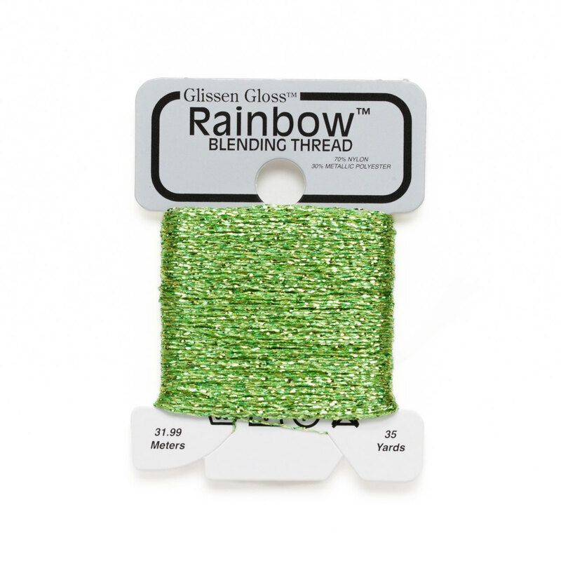 Iridescent lime green Glissen Gloss Rainbow blending thread spool on white background.