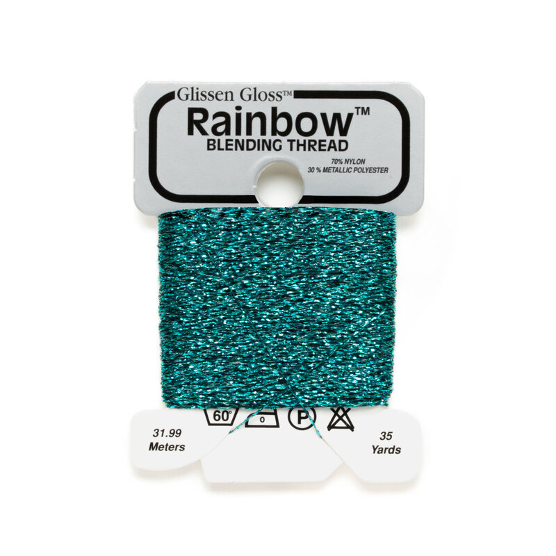 Iridescent viridian Glissen Gloss Rainbow blending thread spool on white background.