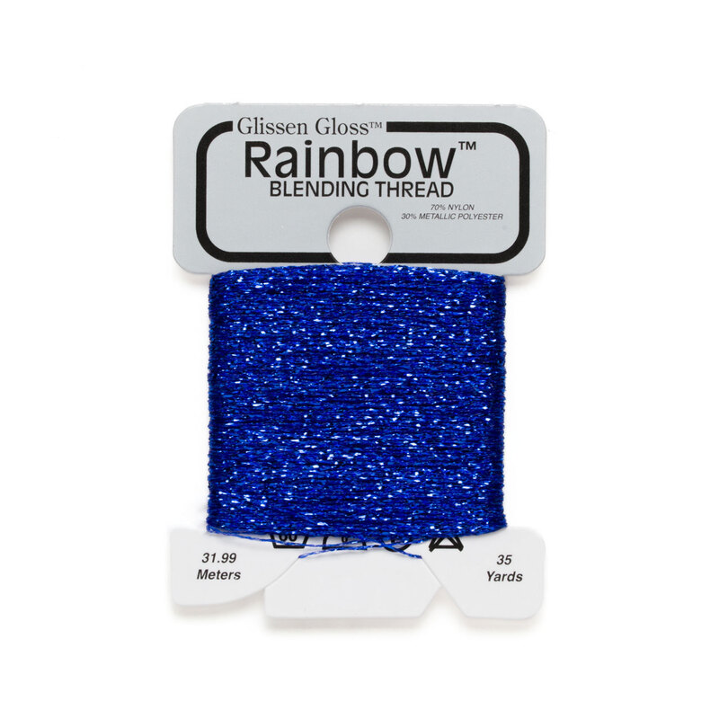 Iridescent royal blue Glissen Gloss Rainbow blending thread spool on white background.