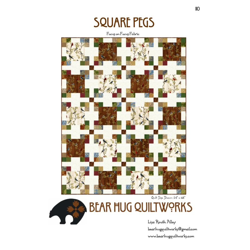 Front of pattern featuring finished project in a natural color scheme quilt.