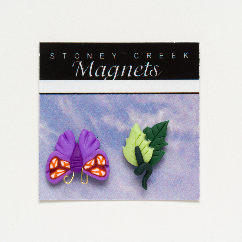 Package of Stoney Creek magnets with a purple butterfly and green leaf design.