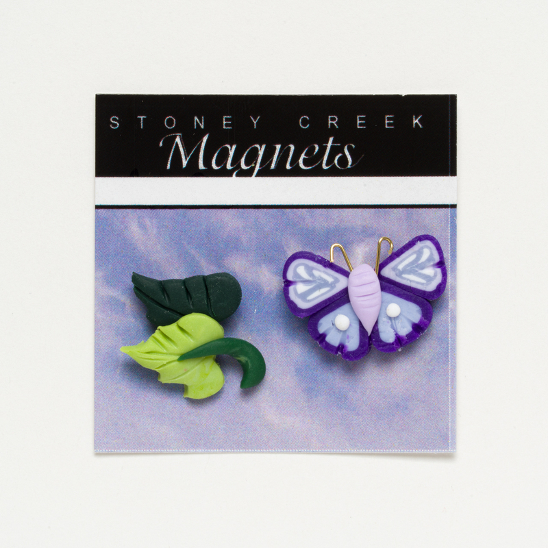 Stoney Creek Magnets package with a green leaf and purple butterfly magnets.