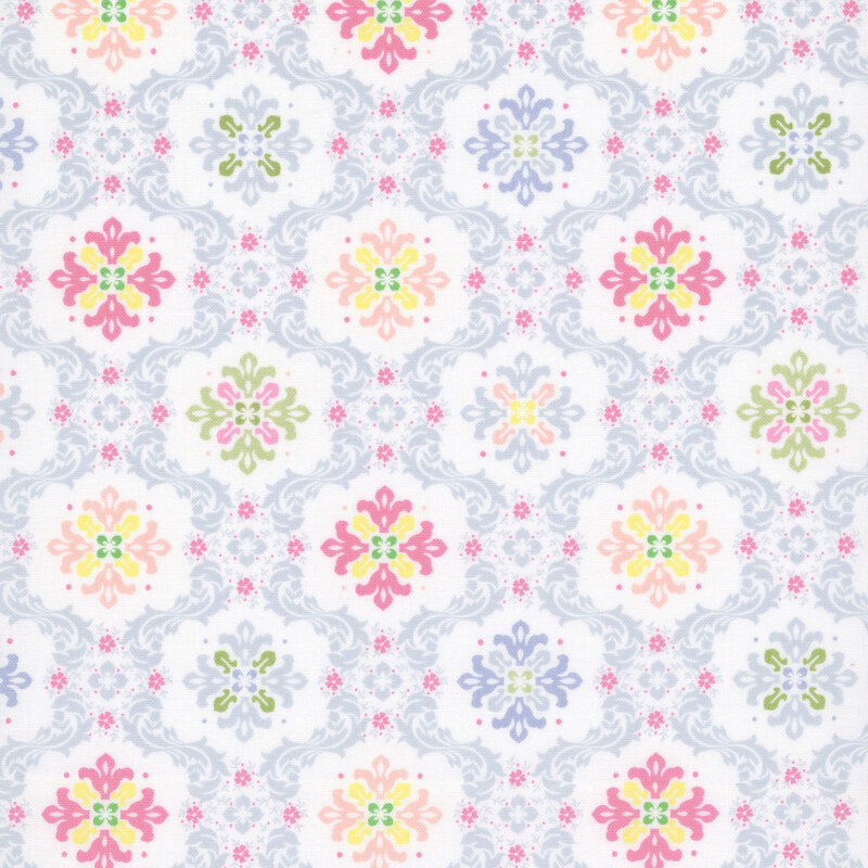 ornate floral medallion print in shades of pink, peach, yellow, green, and periwinkle on a white background.
