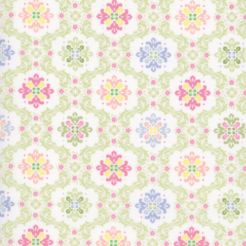 ornate floral medallion print in shades of pink, peach, yellow, periwinkle, and sage on a white background.