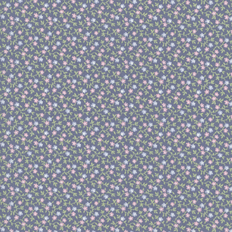 dark periwinkle fabric with a pattern of leafy green vines accented with pink and blue blossoms 