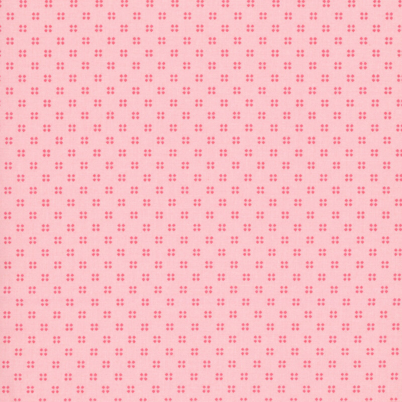 repeating pattern of tonal floral motifs on a warm pink background.
