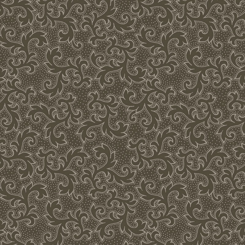 A dark taupe fabric with leaf motifs.