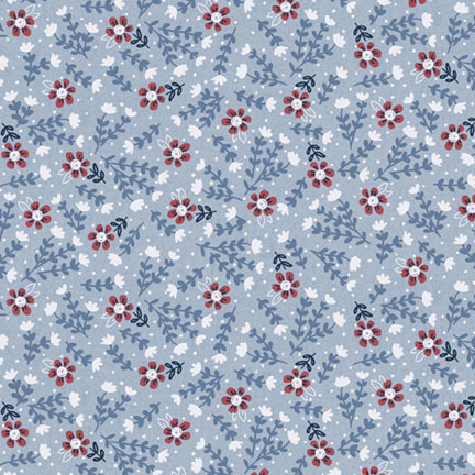 red, white, and blue florals accented with white dots on a vintage blue background