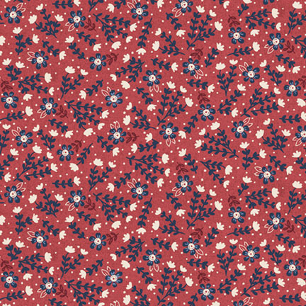 blue, white, and red florals accented with white dots on a watermelon red background