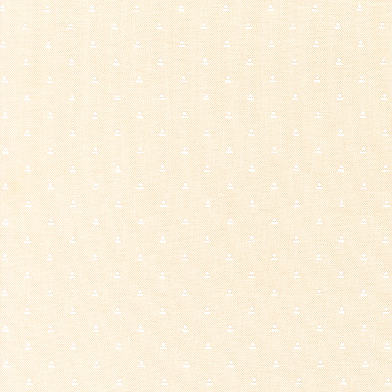 Cream fabric with small, white geometrics in a staggered grid.