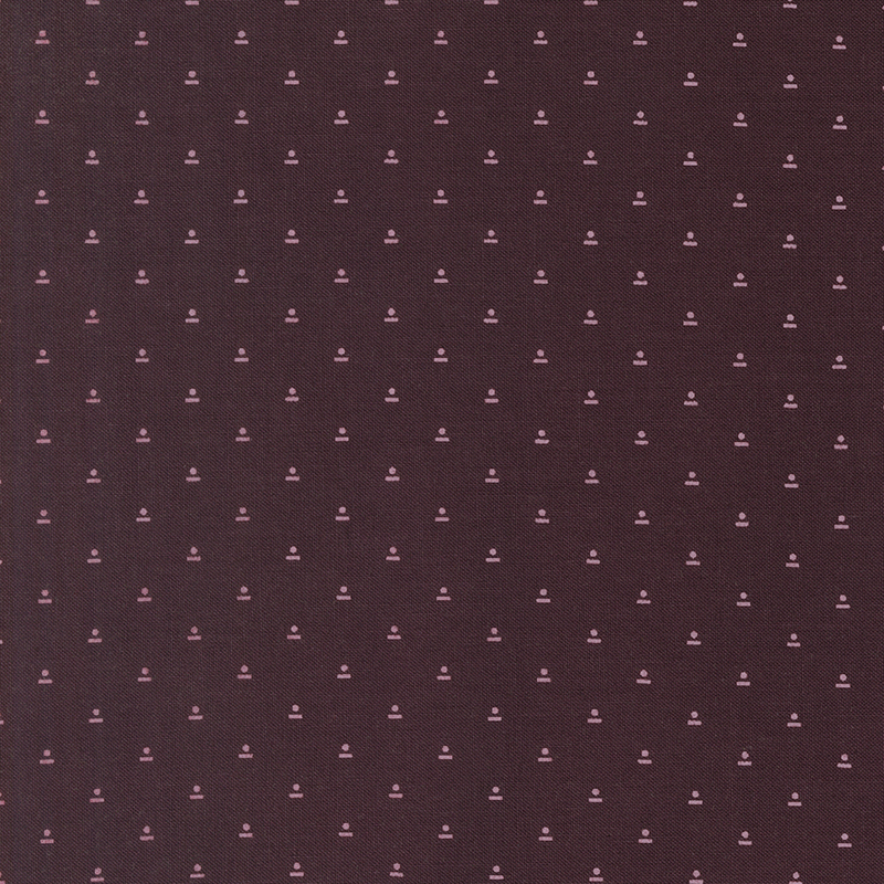 Mulberry fabric with small, mauve geometrics in a staggered grid.