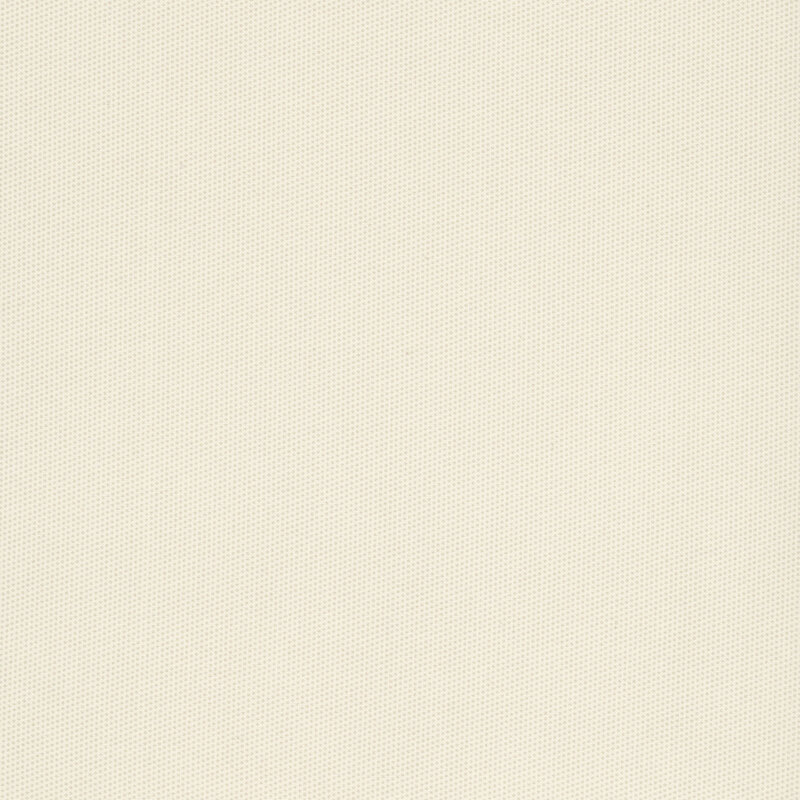 Basic cream fabric with a packed pattern of small tan dots.