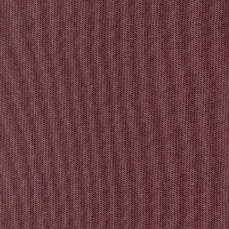 Basic mulberry fabric with a packed pattern of small dark mulberry dots.