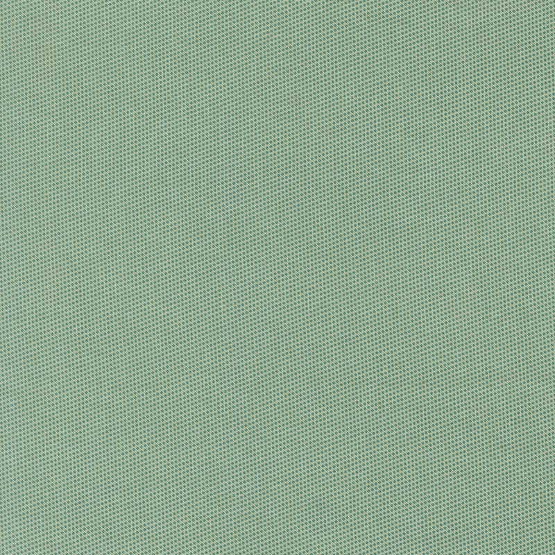 Basic cool sage fabric with a packed pattern of small soft green dots.