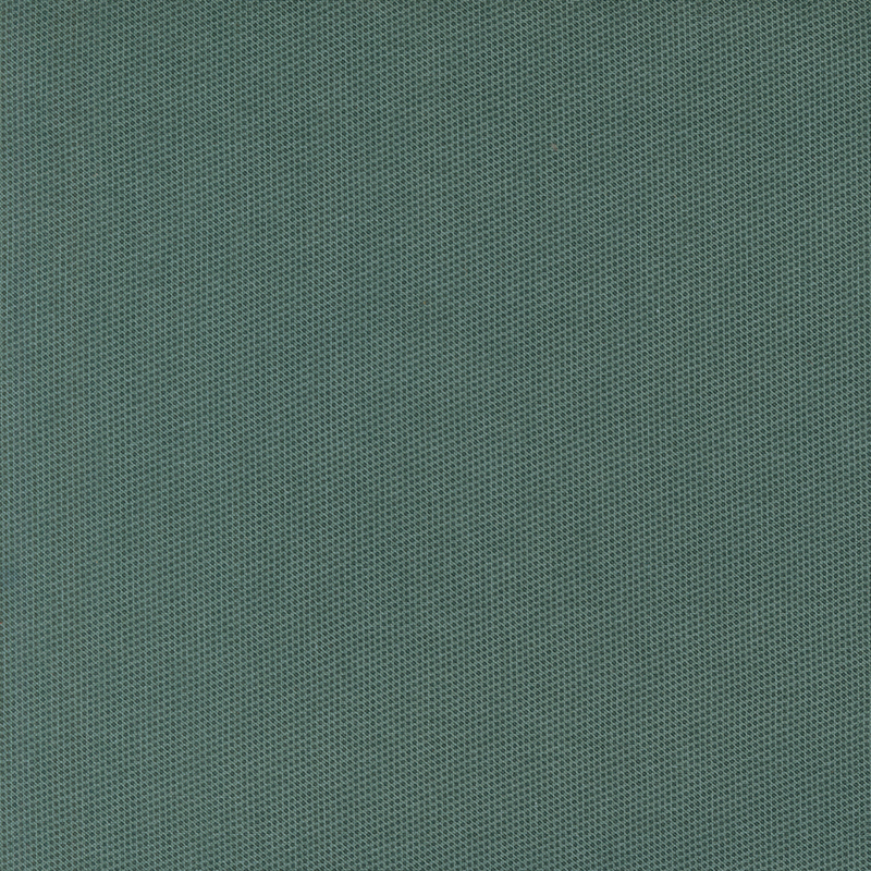 Basic light phthalo green fabric with a packed pattern of small dark teal dots.