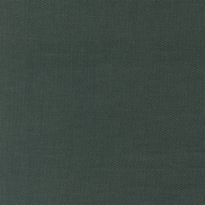 Basic dark phthalo green fabric with a packed pattern of small dark green dots.