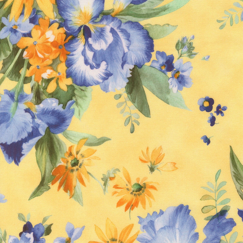 Soft and mottled yellow fabric topped with large bunches of florals.
