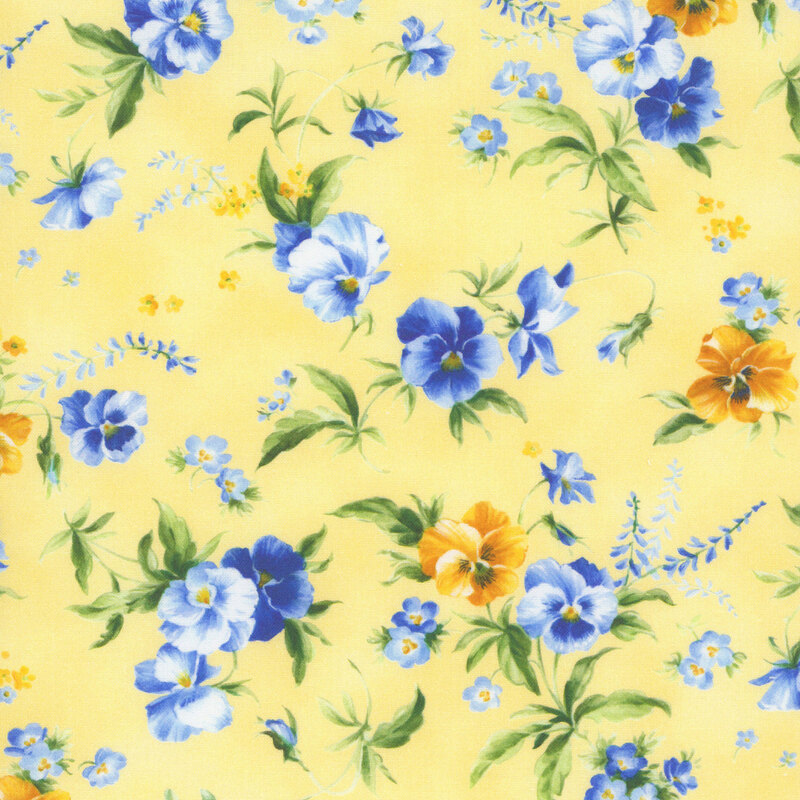 Canary yellow mottled fabric with scattered florals and leaves.