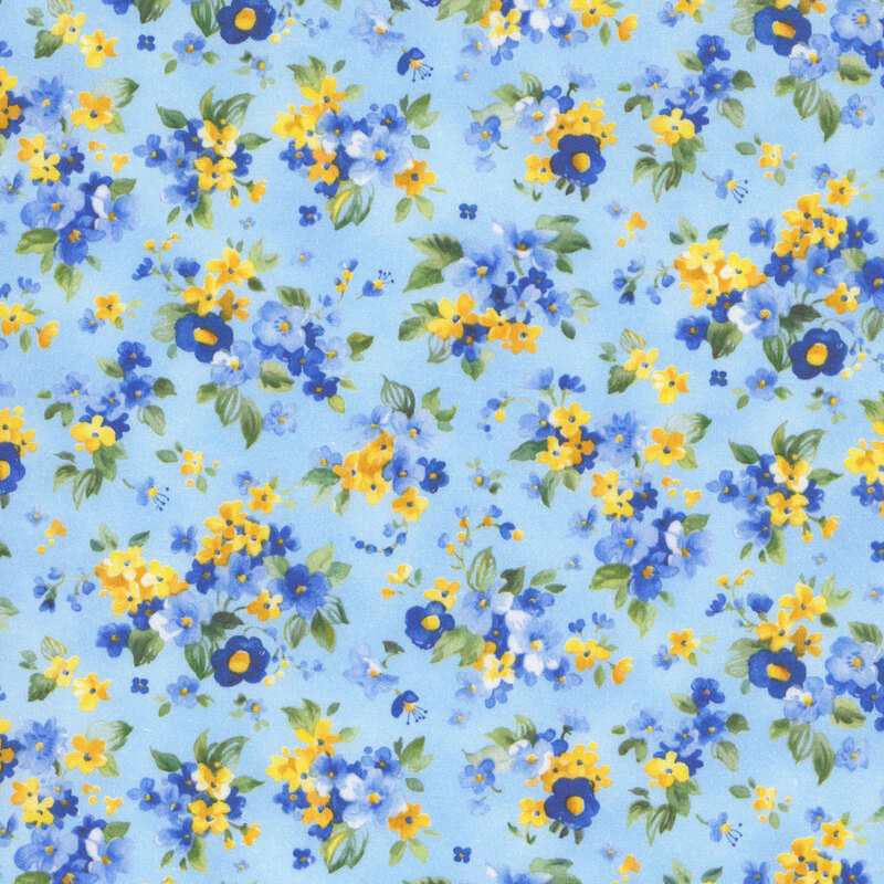 Light blue fabric with small bunches of yellow and blue florals.