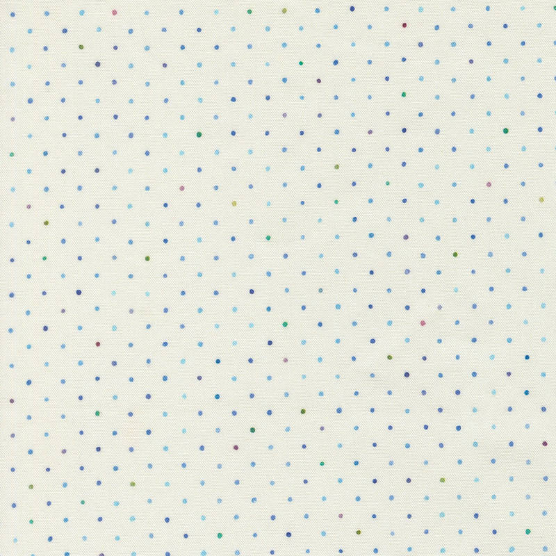 Ivory fabric with a multicolored staggered grid of small dots on a mottled background.