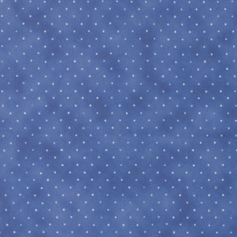 Royal blue fabric with a multicolored staggered grid of small dots on a mottled background.