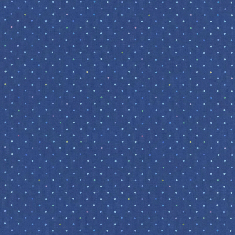 Deep blue fabric with a multicolored staggered grid of small dots on a mottled background.