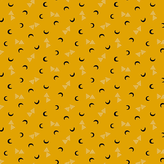 This yellow gold fabric features black crescent moons and clusters of dotted triangles. 