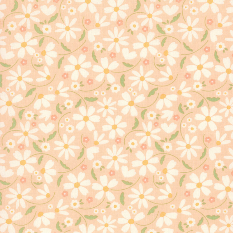This pastel peach fabric features tossed white daisies. 