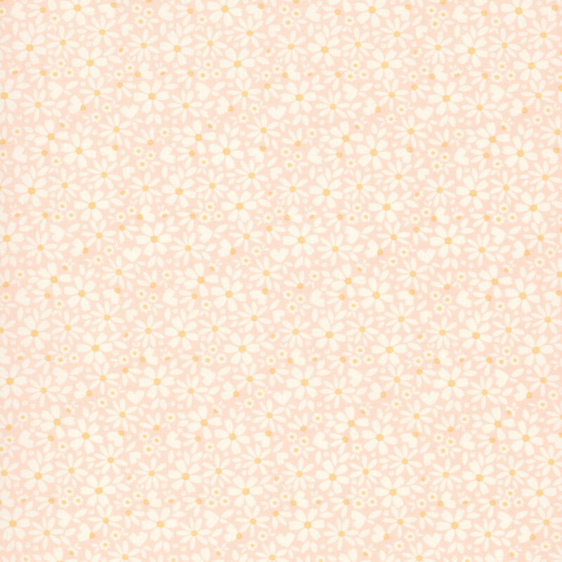 This soft pink fabric features packed white daisies. 