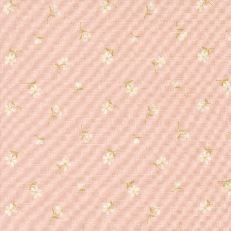 This soft pink fabric features tossed white daisies. 