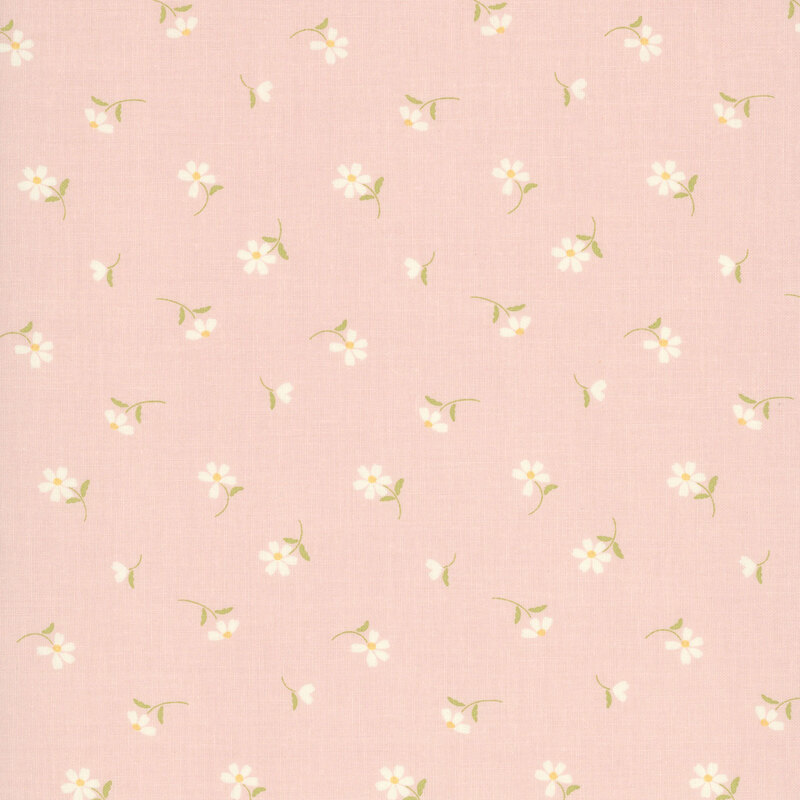 This soft pink fabric features tossed white daisies. 