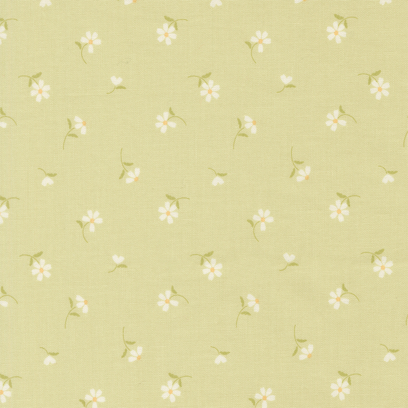 This spring green fabric features tossed white daisies. 