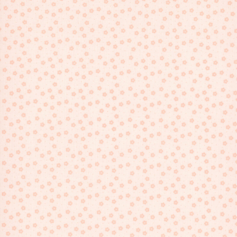 This soft pink ditsy fabric features tonal florals. 
