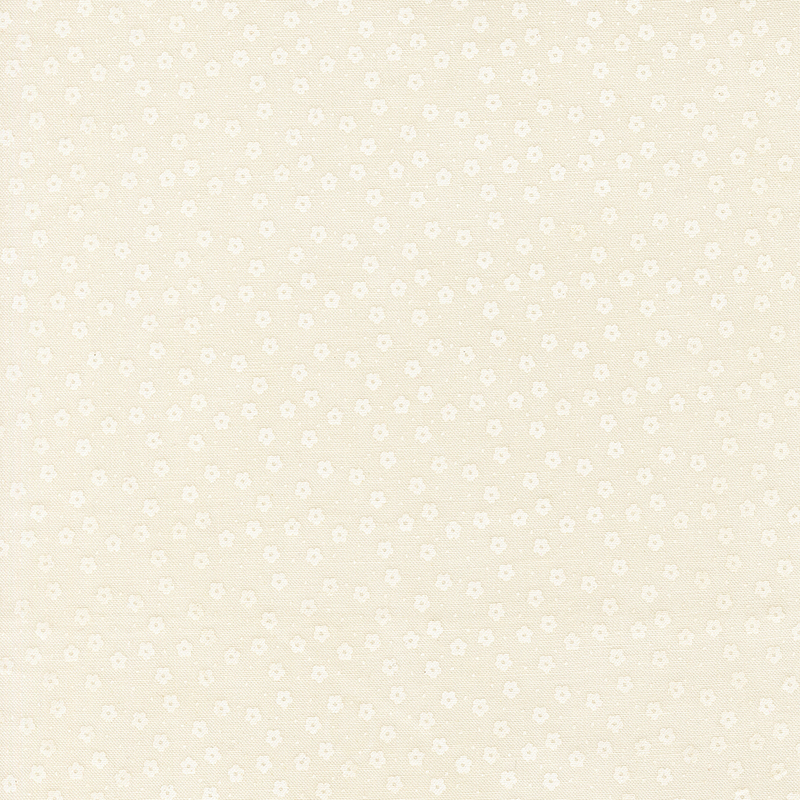 This white on white ditsy fabric features tiny florals. 