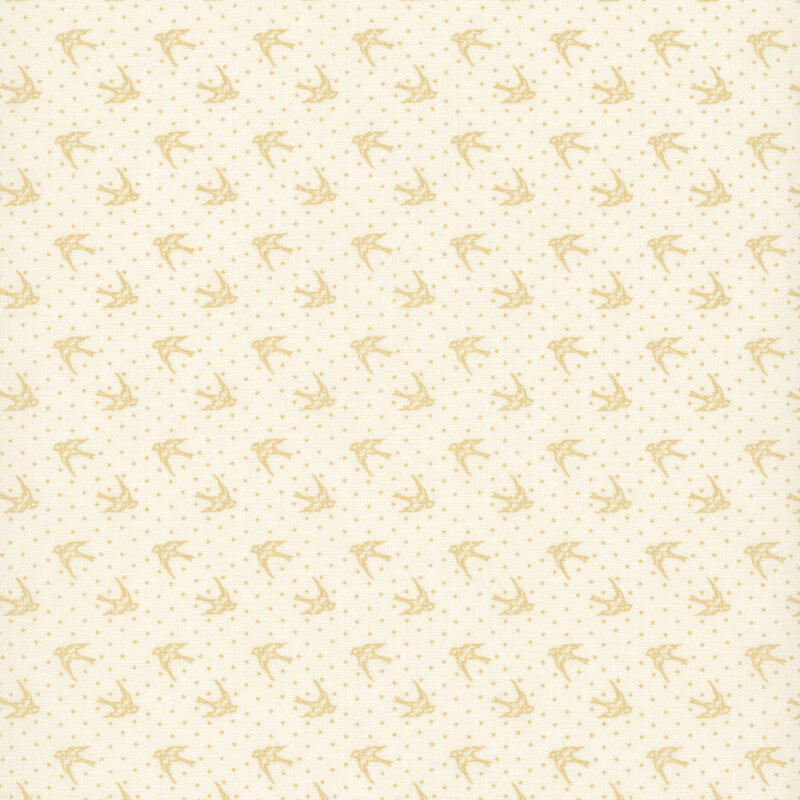 Cream fabric with dotted tan background topped with tan cardinals in flight.