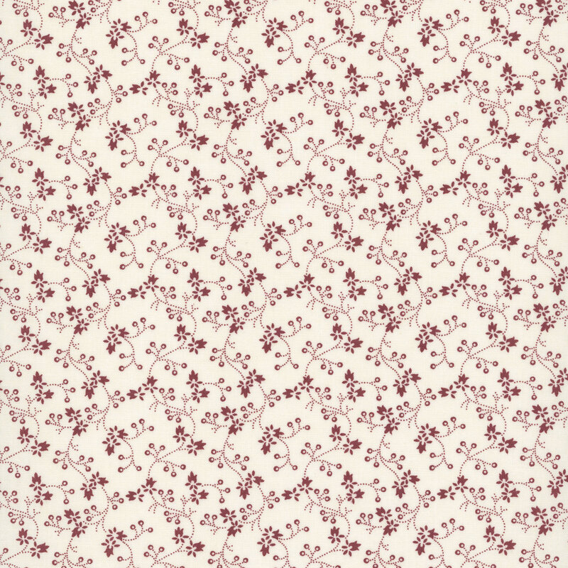 Cream fabric with a pattern of vertical red vines and florals.