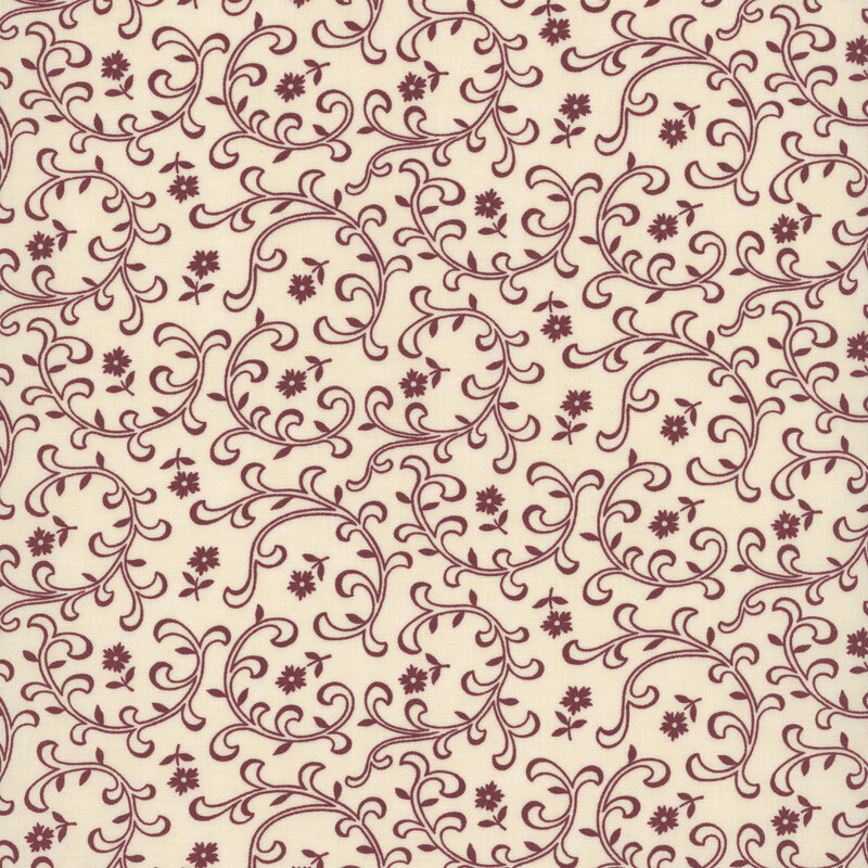 Tan fabric with tossed red florals and stylized leaves and vines.