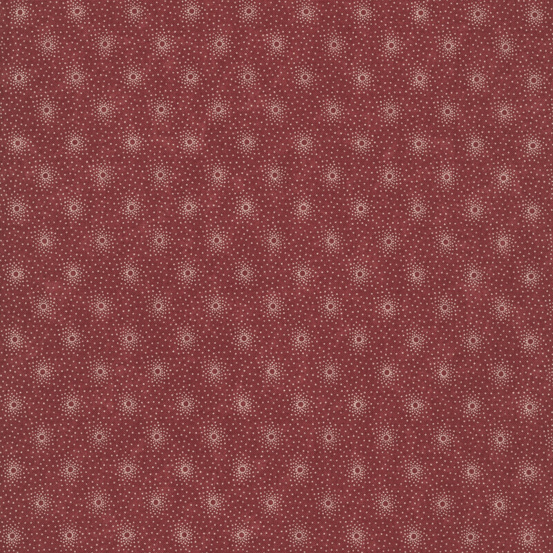 Red fabric with staggered grid of small, concentrated tan dot clusters.