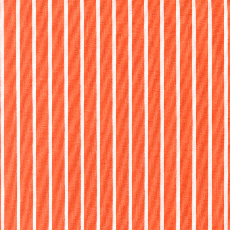 Orange fabric with small white stripes.