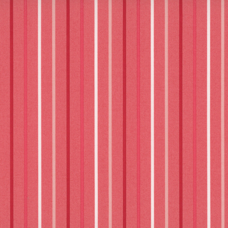 Orange-pink fabric with small white, red, dark red, and coral stripes.