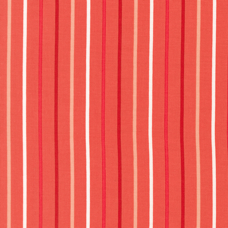 Orange-pink fabric with small white, red, dark red, and coral stripes.