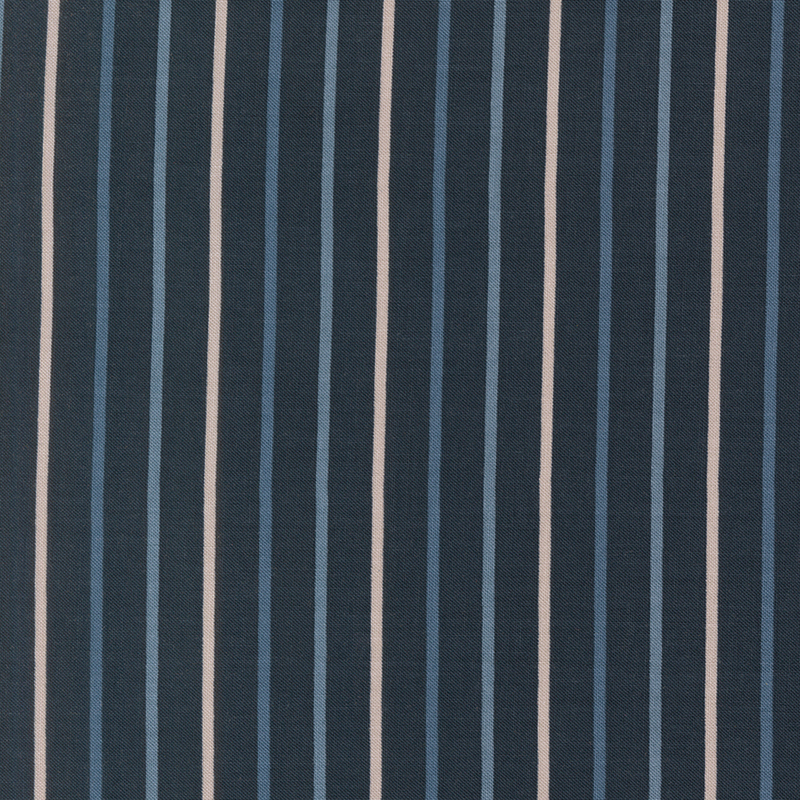 Deep midnight blue fabric with small lagoon blue, ice blue, and tan stripes.