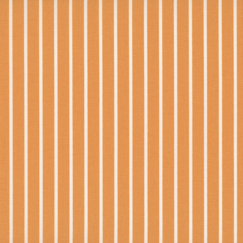 Honey fabric with small white stripes.
