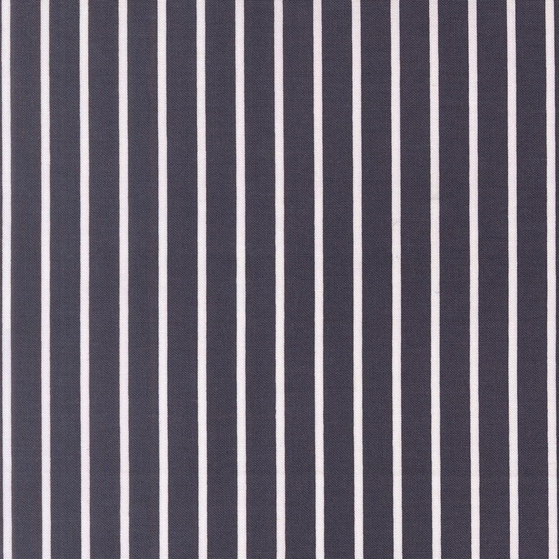 Deep blue fabric with small white stripes.