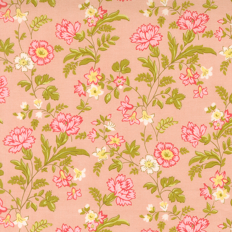 A peach fabric with pink and blue florals. 